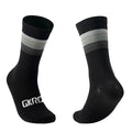 Compression cycling socks worn while riding